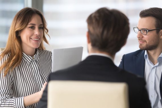 businesswoman talking to a client